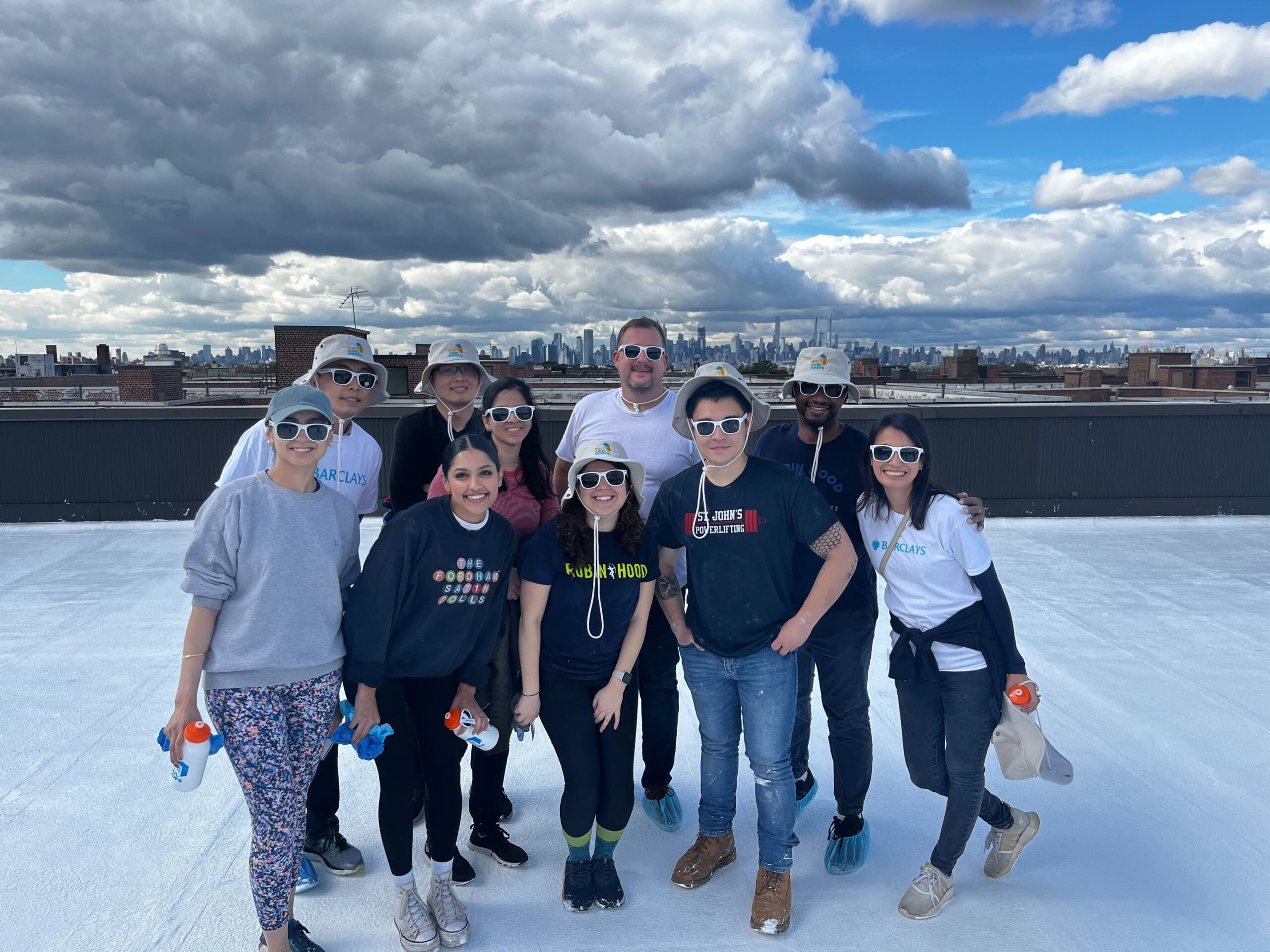 robin hood partners volunteering for the hope program coolroofs program
